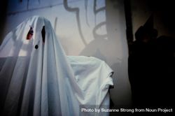 Close up of person in sheet ghost costume 41YaN4