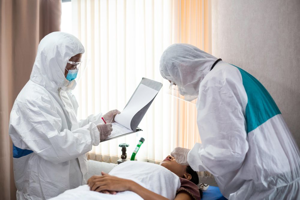 Emergency doctor with patient and nurse