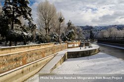 River after snow storm in Granada, Spain 0v9jRb