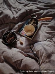 Turkish coffee on notebook on grey bedsheets 5kkRQ5