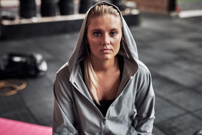 Serious woman wearing a hoodie