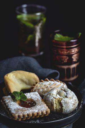 Traditional tea with mint and assorted Arab sweets