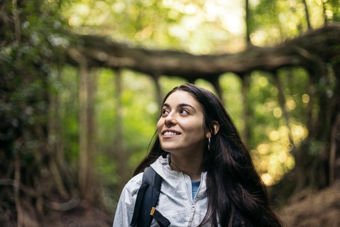 White brunette woman walking in the jungle in Costa Rica