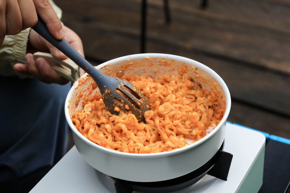 Cooking Korean Spicy Ramyeon Carbonara on Camping Ground