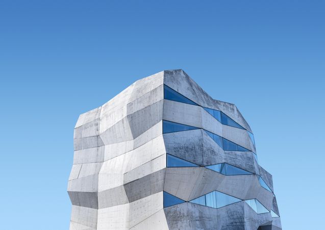 Geometric building against a blue sky