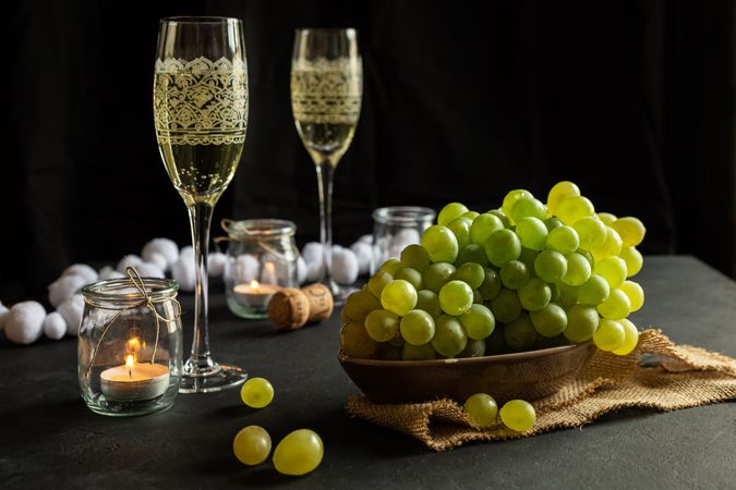 Glasses with wine and grapes