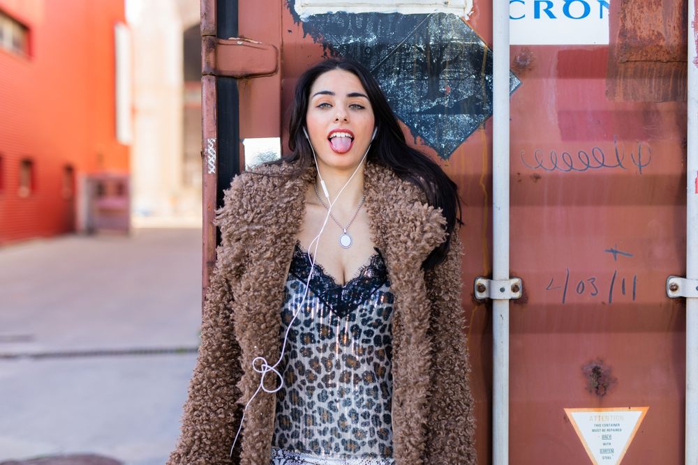 Excited female on city street