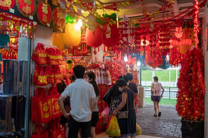 People at the market buying Chinese New Year decoration