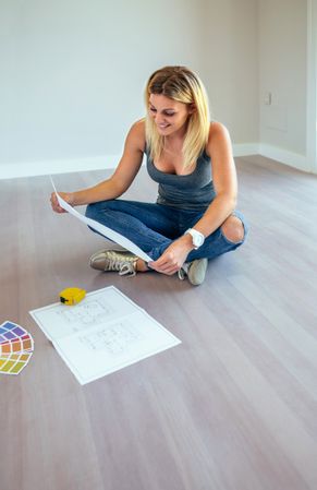 Woman looking house plans