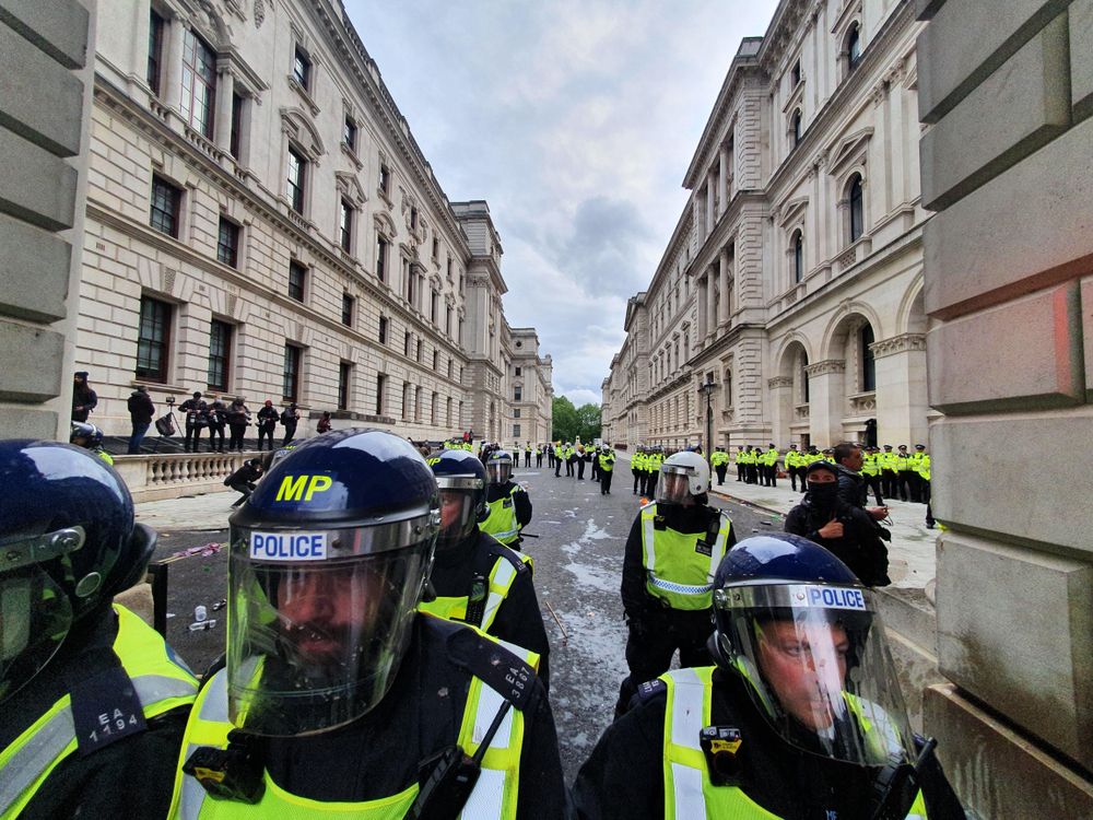 Police standing in lines to face protestors