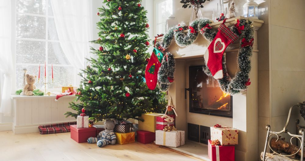 Decorated Corner in Modern House with Christmas Tree, Fireplace and Gifts. Home of a Family Celebrating with Joy