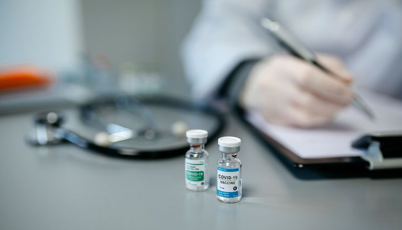Two different vials of coronavirus vaccine