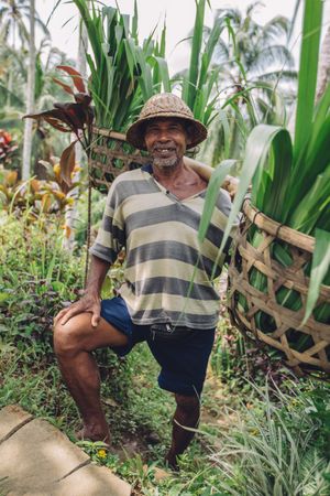 Man standing in farm with seedlings in Bali