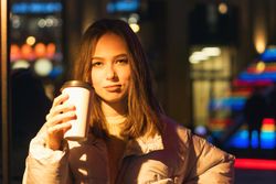 Woman enjoying nightlife in city