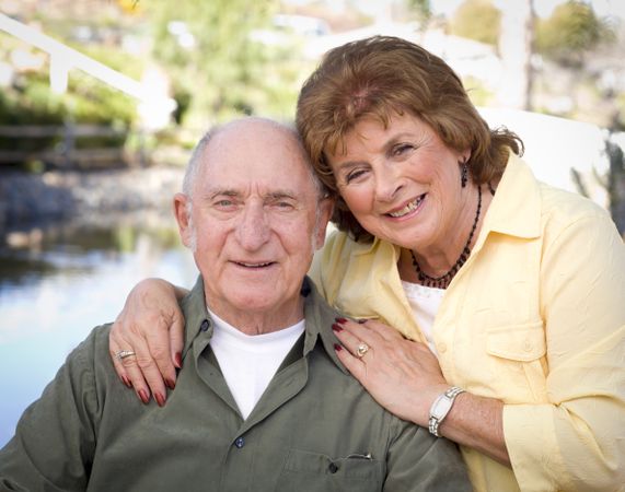 Happy Mature Couple Relaxing in The Park
