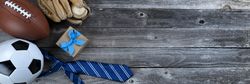 Father’s day with ball sport gifts on old wood table