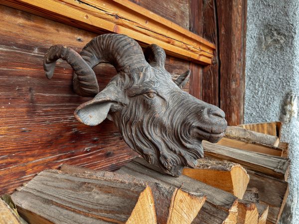 Mountain goat wooden carving in Rossiniere, VD