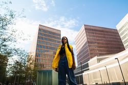 Trendy Black woman on city street