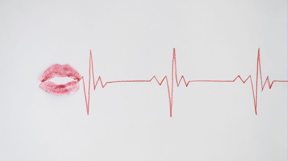 Kiss with ekg line coming out of it