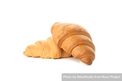 Side view of two croissants isolated on plain background 5Rmx10