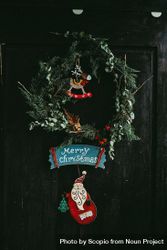 Christmas garland on a dark door 4AXmR5