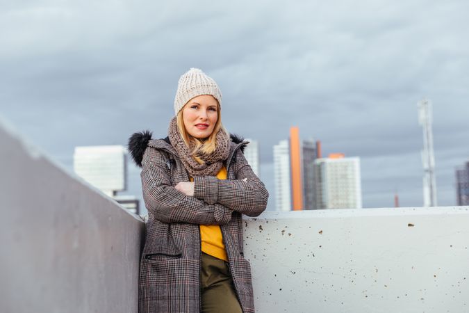 Portrait of blonde woman posing in the city