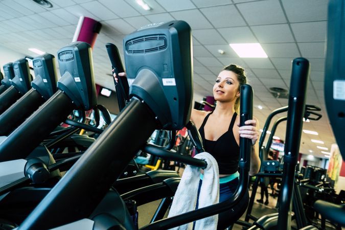 woman on exercise machine