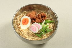 Silver bowl of ramen with karaage chicken