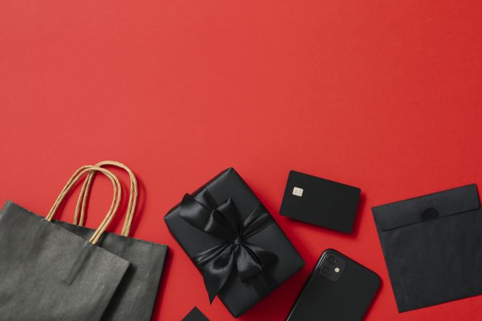 Sale concept with gift box on red background