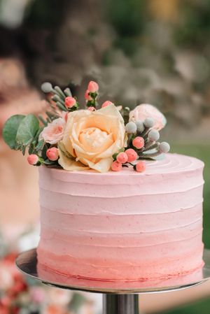 Pink cake with flower on top