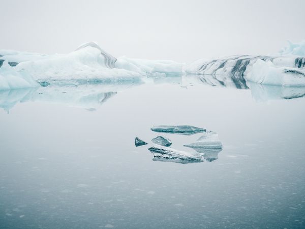 Ice on water between snow