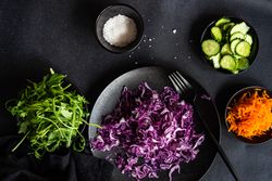 Top view of fresh salad bowl with red cabbage