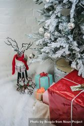 Gift boxes under Christmas tree 5lKBV0