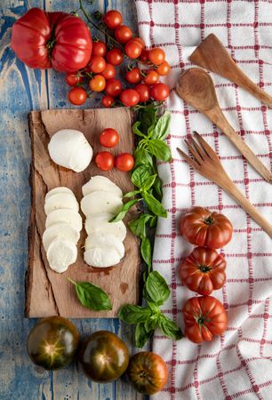 Salad ingredients on board and napkin
