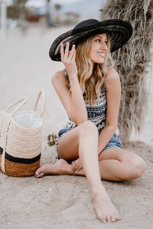 Young female relaxing on beach