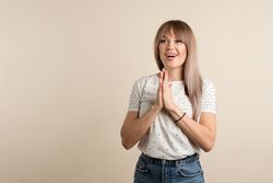 woman posing in pastel background