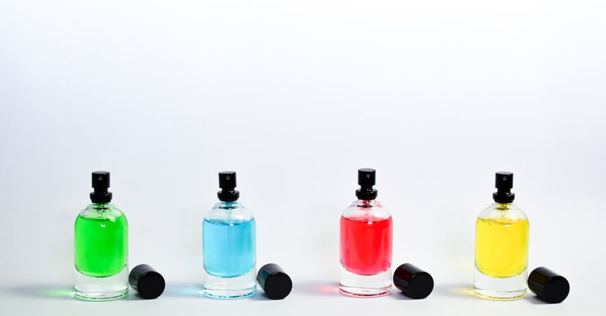 Four colorful perfume bottles