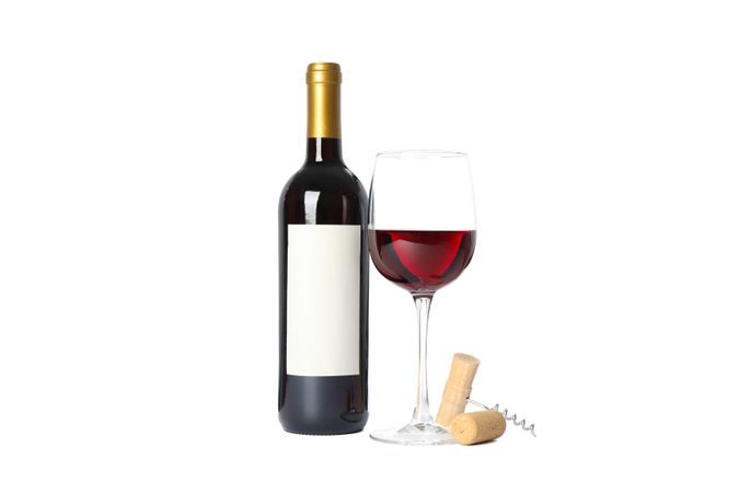 Bottle and glass with red wine, corkscrew isolated on plain background