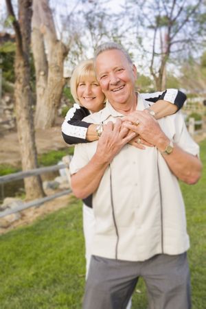Affectionate Older Couple Portrait At The Park