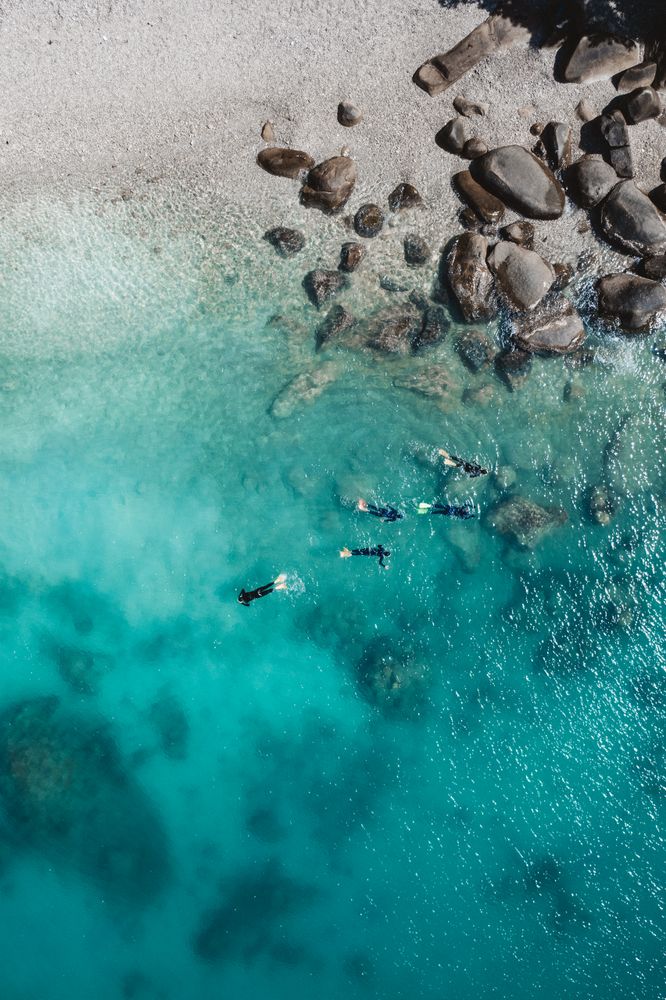 Aerial view of rocks near ocean