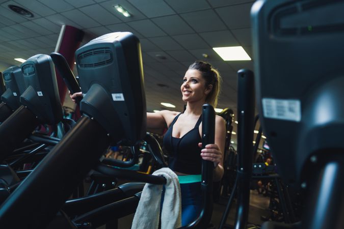 woman on exercise machine