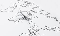 Airplane model going over drawn map