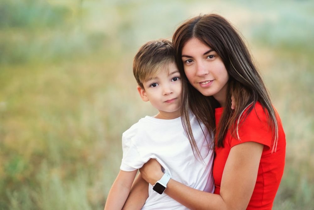 Affectionate mom with son outdoor