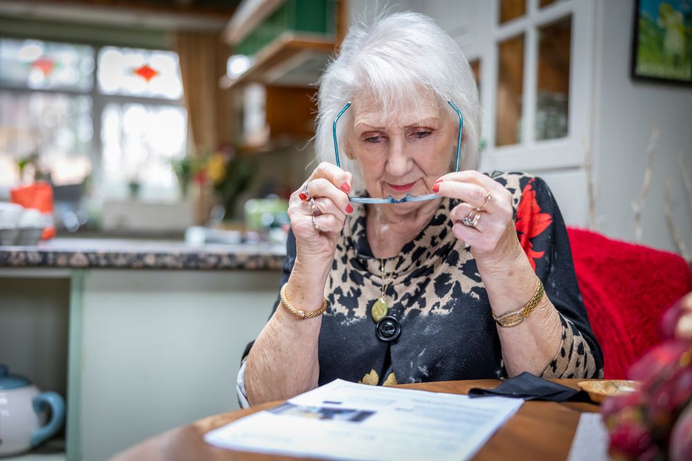 Woman at kitchen table