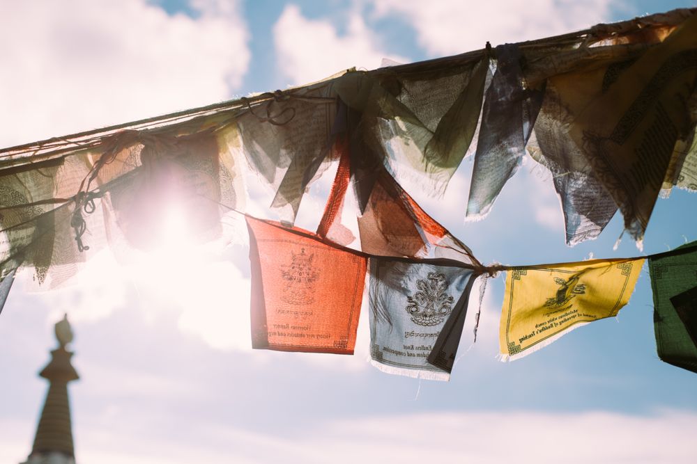 Buddhist prayer flags hung in the sunshine