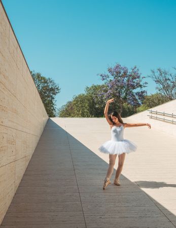 Ballerina performing classical position outside