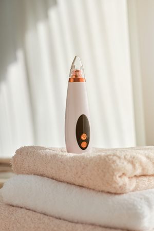 Blackhead remover on towels in room
