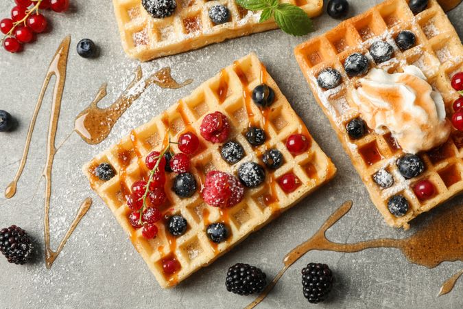 Flat lay composition with sweet belgian waffles, top view