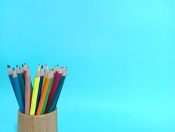 Color pencil layout space on light blue background