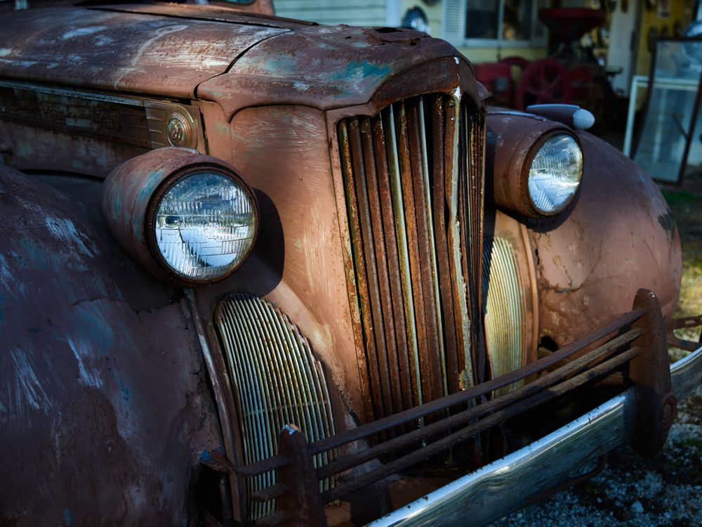 Old, rusted truck outside the Cutler General Store in the Carroll County, Indiana